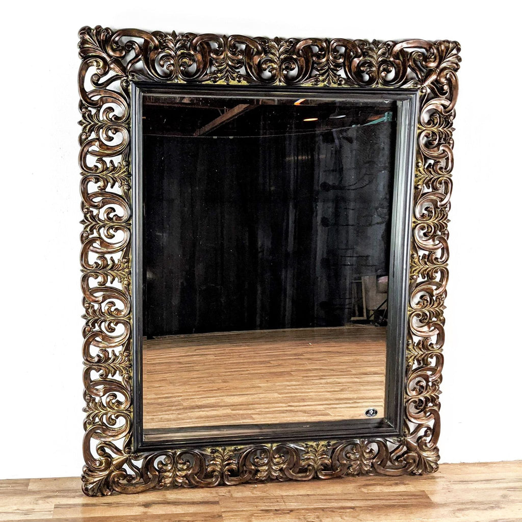 Full-length mirror with a classic brown vine-patterned, burnished wooden frame.