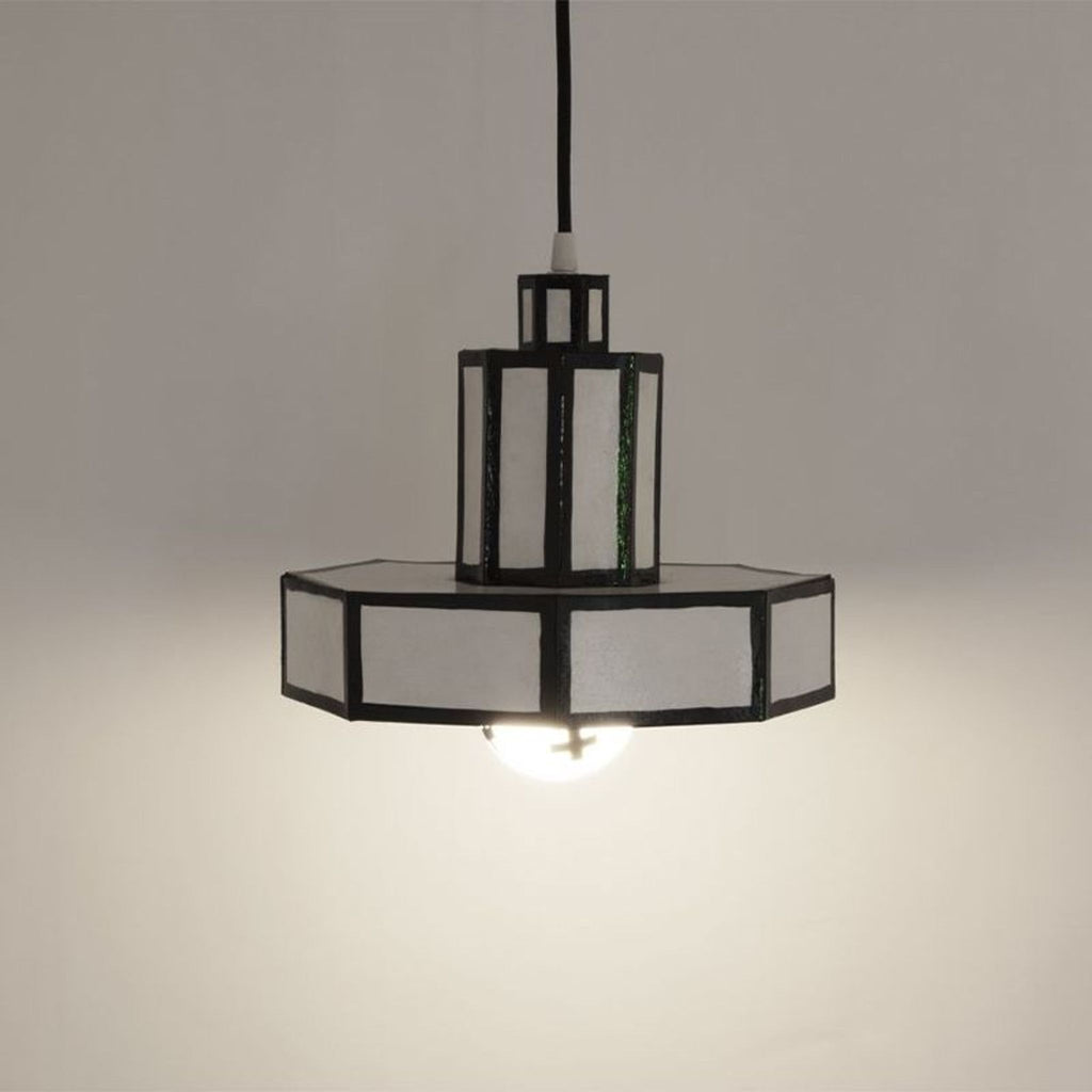 a black glass and metal chandelier by [ unused0 ]
