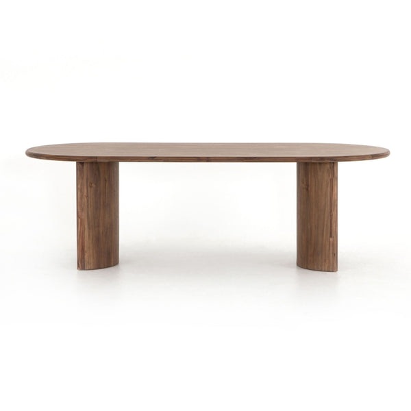 the dining table is a modern dining table with a rounded top.