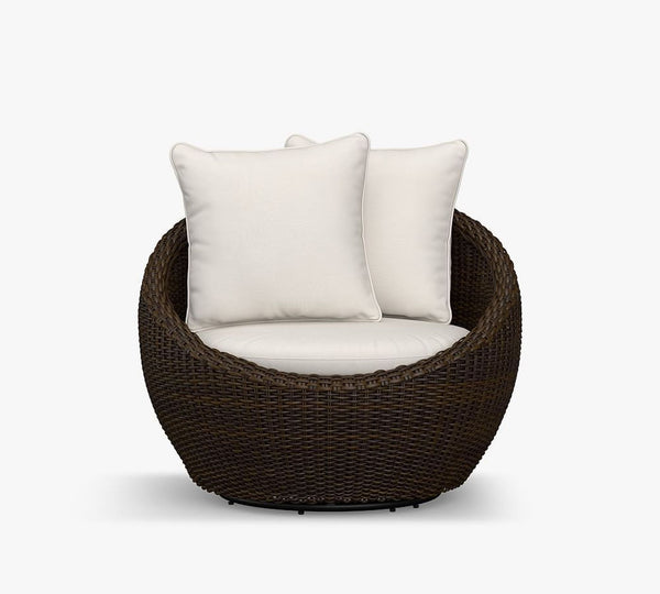 1. Rounded wicker papasan outdoor chair with thick white cushions and two pillows, offering cozy, modern seating.