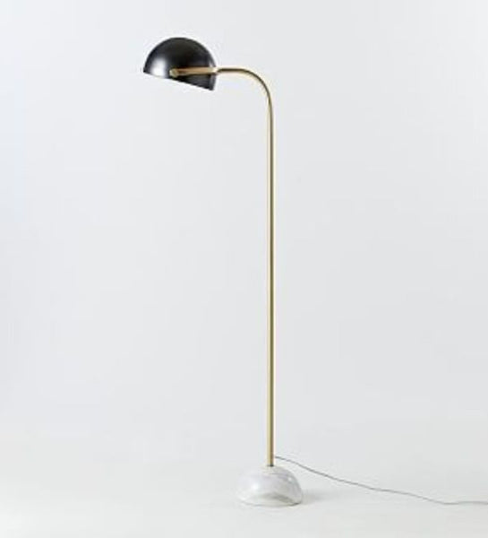 West Elm antique bronze finish floor lamp with marble base, assembled, against a white background.
