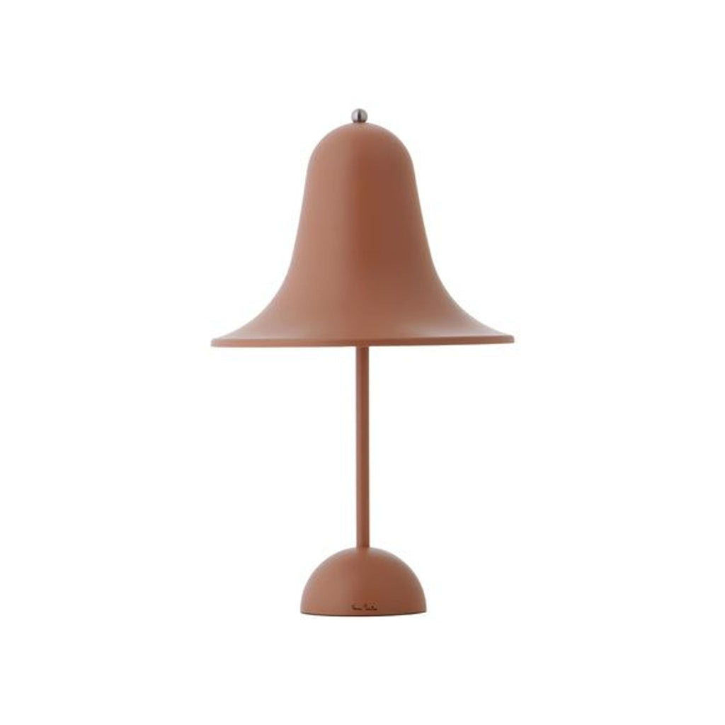 a lamp with a red and white face on it 