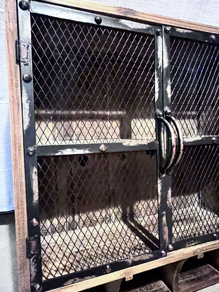 a large, heavy, and heavy duty metal door with a metal frame.