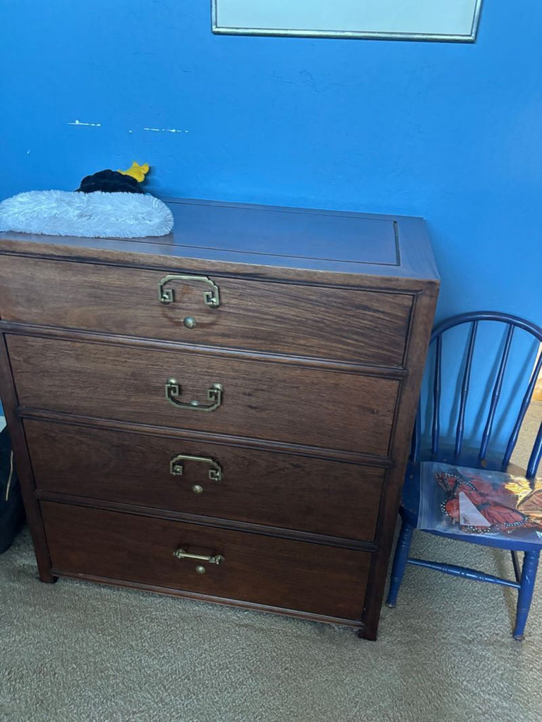 Certainly! It appears the image itself or its details were not provided. Please upload or describe the image so I can generate the alt texts for the dresser.