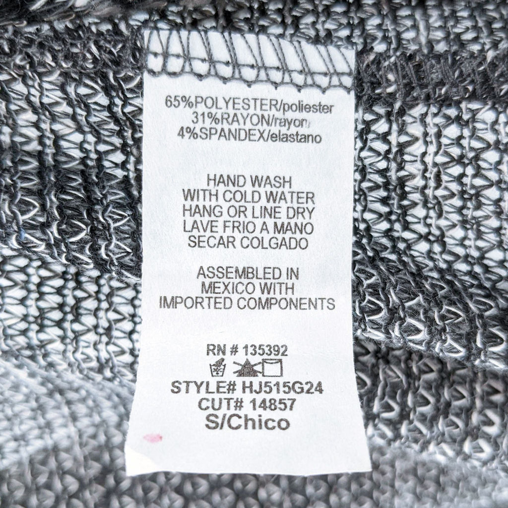 Care label on a Kane brand women's garment showing fabric composition, washing instructions, and manufacturing details.