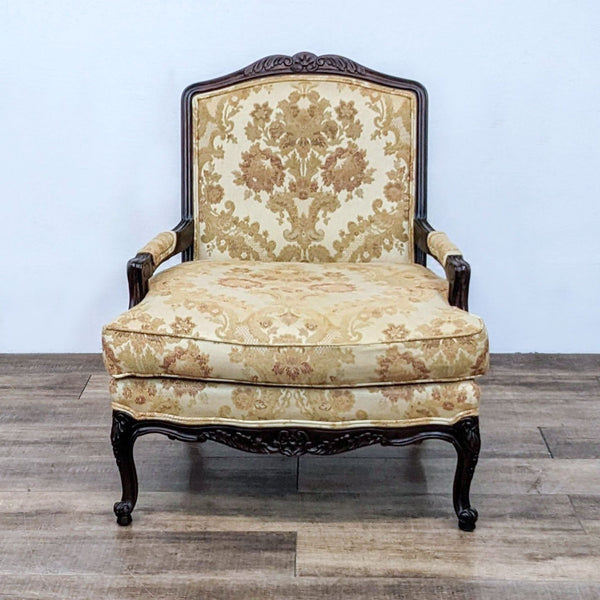Thomasville Patriarch accent armchair with carved wood frame and neutral floral upholstery, front view.