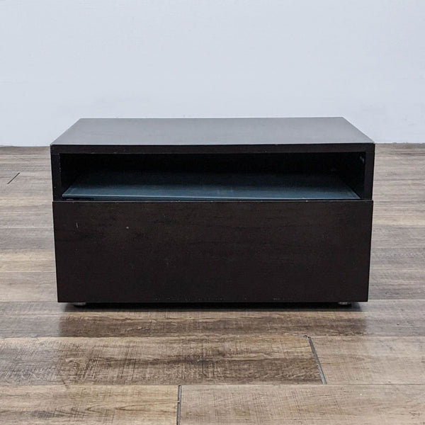 Front view of a Reperch brand end table in dark finish with an open storage compartment.