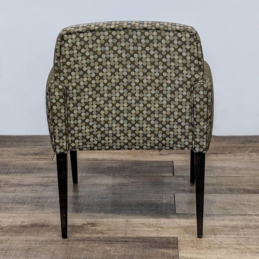 Haworth Galerie lounge chair with contemporary design, polka-dot upholstery, and tapered wood legs.