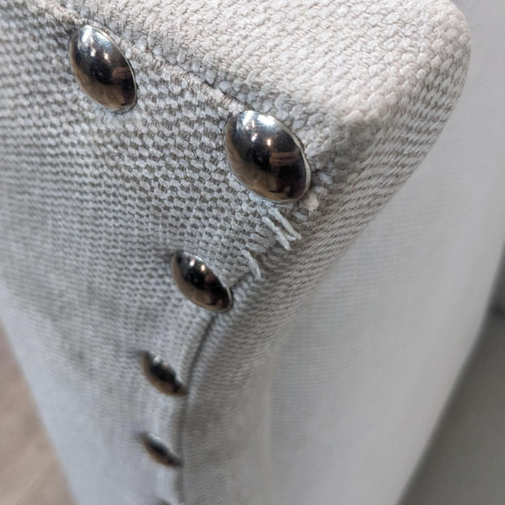 Alt text 3 (if necessary for the third image): Close-up of the linen blend fabric and nailhead trim on the Reperch contemporary wingback chair, highlighting the texture and details.
