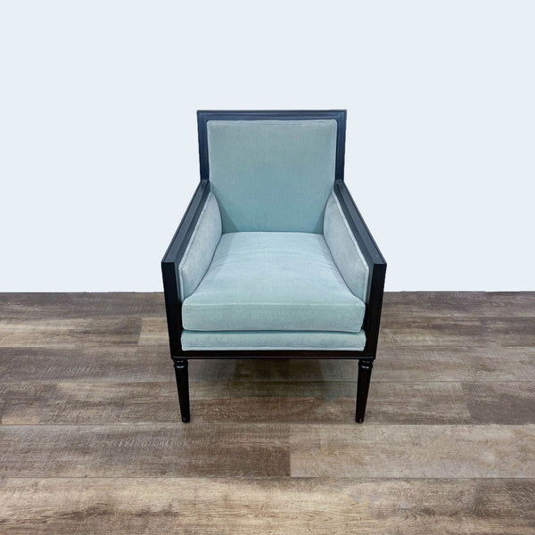 Reperch brand transitional armchair with black wood frame and light blue velvet upholstery, viewed from the front.