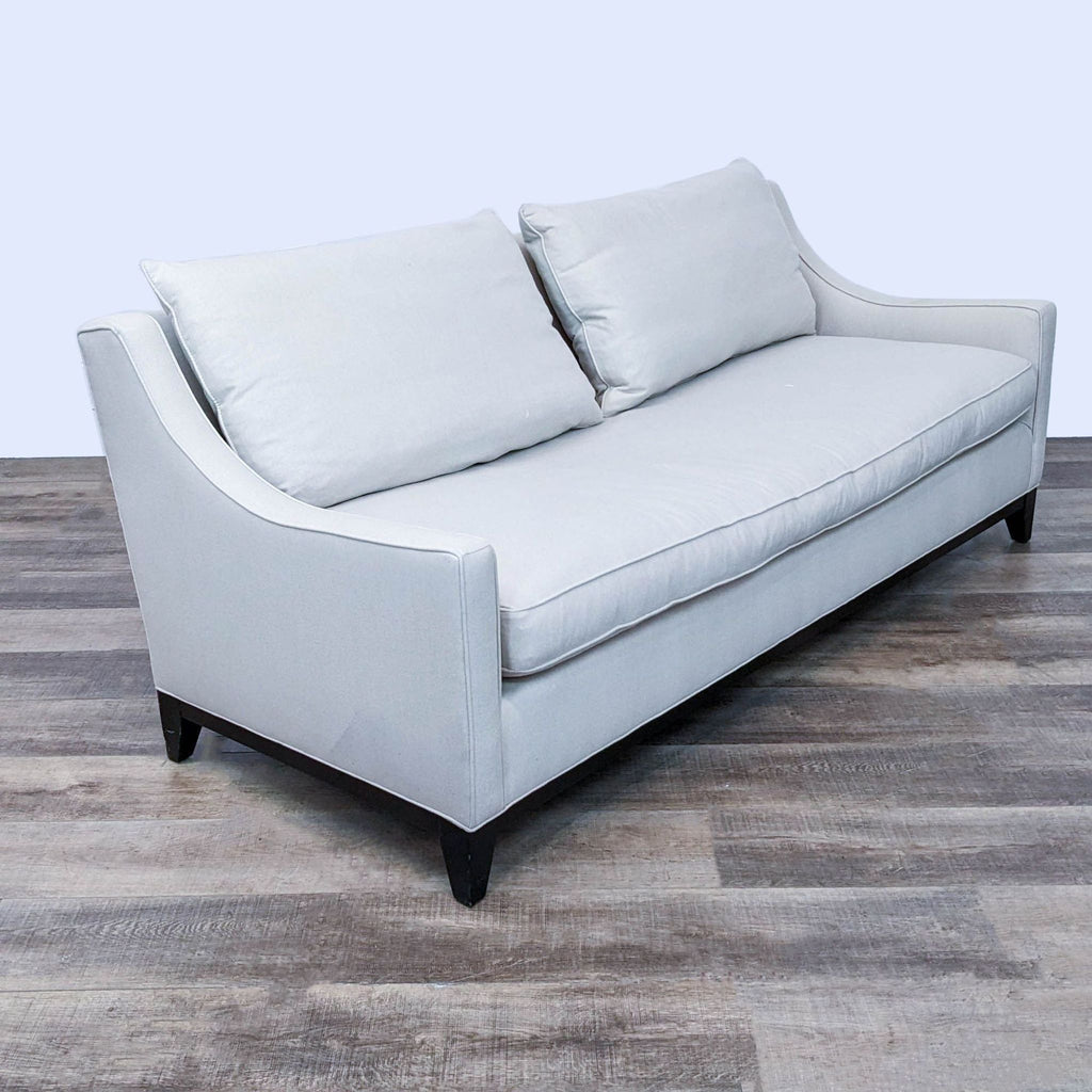 Alt text 2: Contemporary 80" neutral-tone bench seat sofa by Williams Sonoma, displayed in profile view with a wooden floor backdrop.