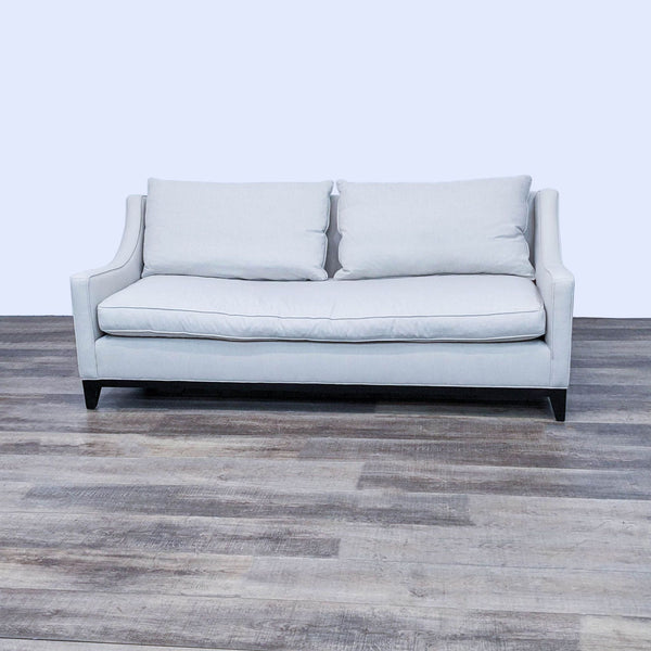 Alt text 1: Williams Sonoma 3-seat off-white Presidio sofa with narrow arms and dark wood frame on a wood floor.