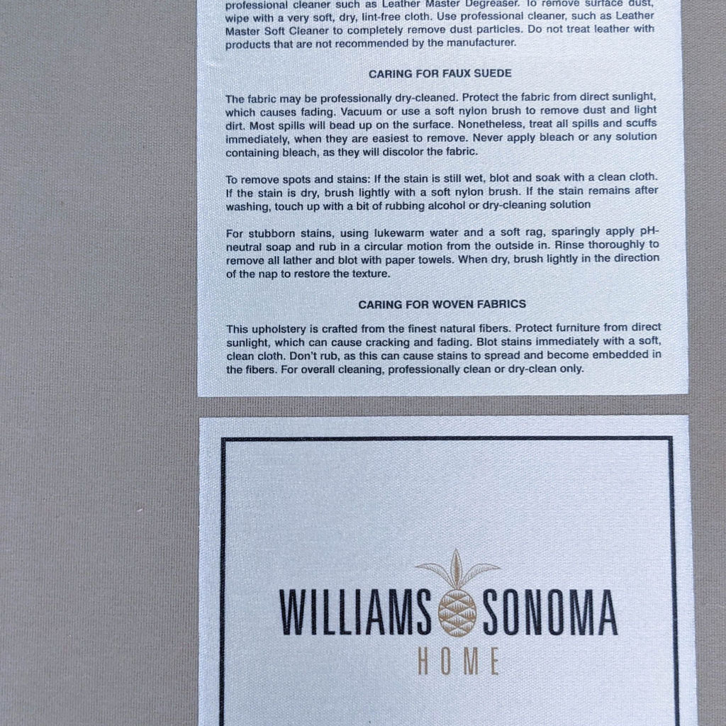 Close-up of care instruction labels for various fabrics from Williams Sonoma Home.