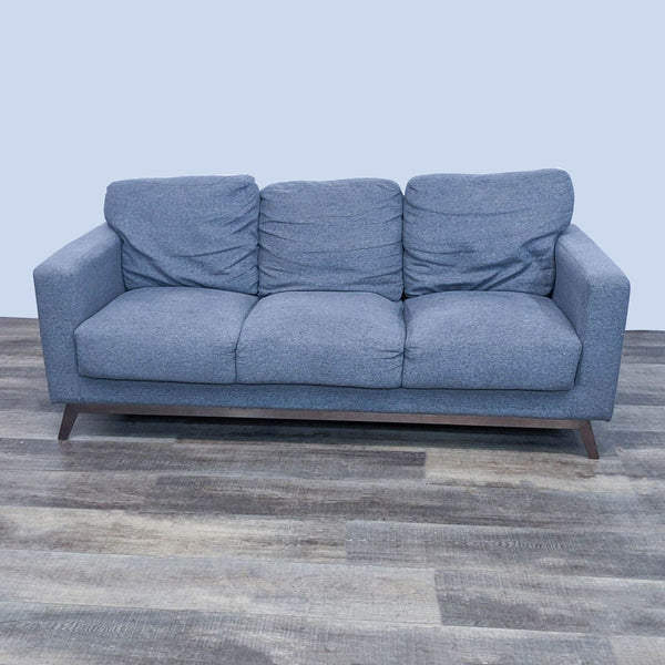 Zuo Modern three-seat track arm sofa with T-back cushions and tapered wooden feet, in a gray fabric.