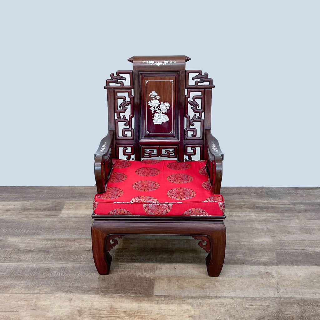 Reperch Oriental rosewood armchair with red cushion, mother of pearl inlays, and intricate carvings, front view.