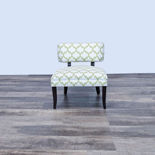 Custom lounge chair with lattice print and ebony wood legs by San Francisco Design Center.