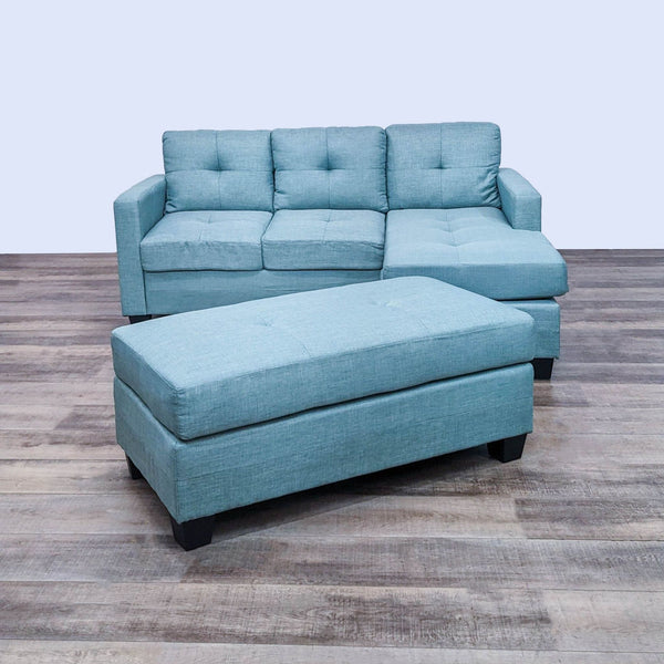 a couch with a blue couch cushion and a blue chair 