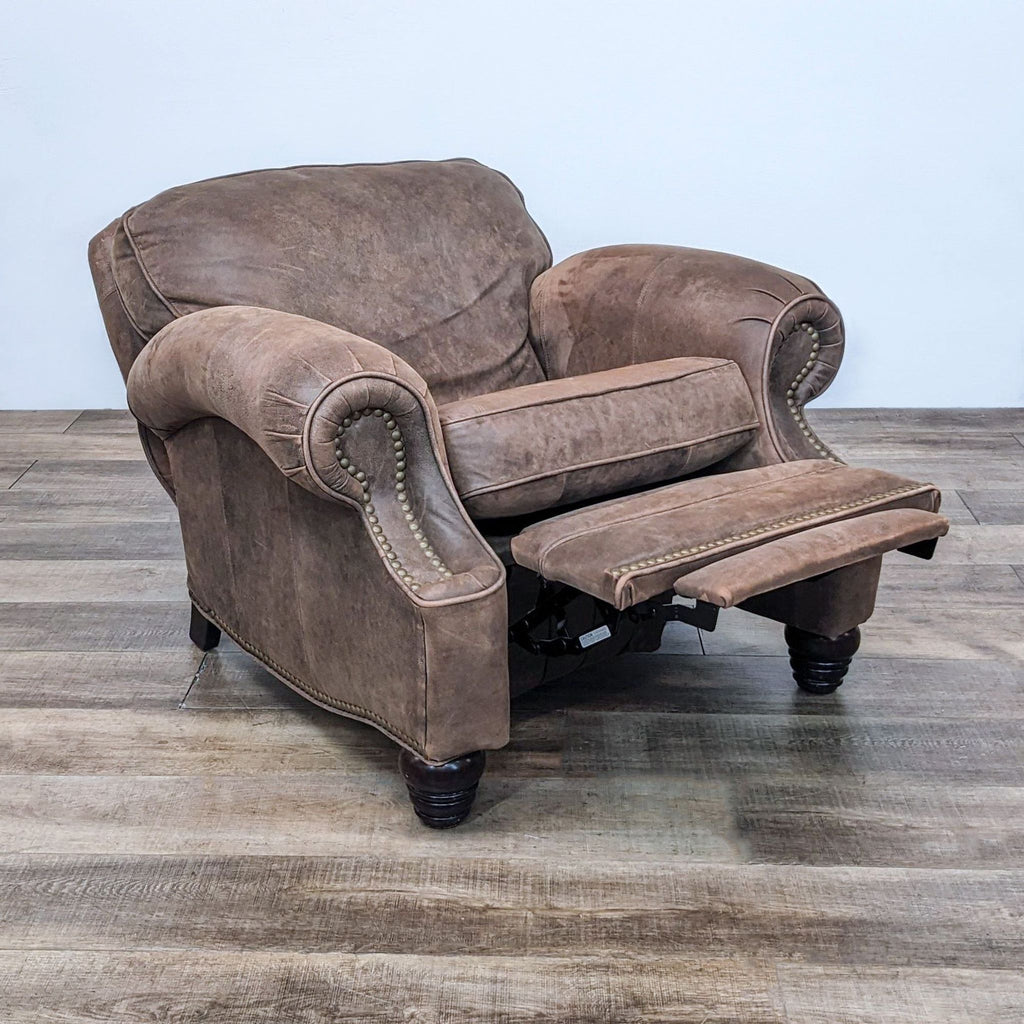 Alt text 2: Longhorn recliner by BarcaLounger shown with footrest extended, featuring classic rolled arms and nail head accents.