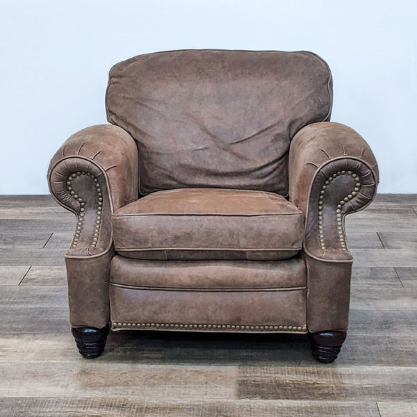 Alt text 1: BarcaLounger Longhorn recliner with solid pillow back, rolled arms, and decorative nail head trim on a wooden floor.