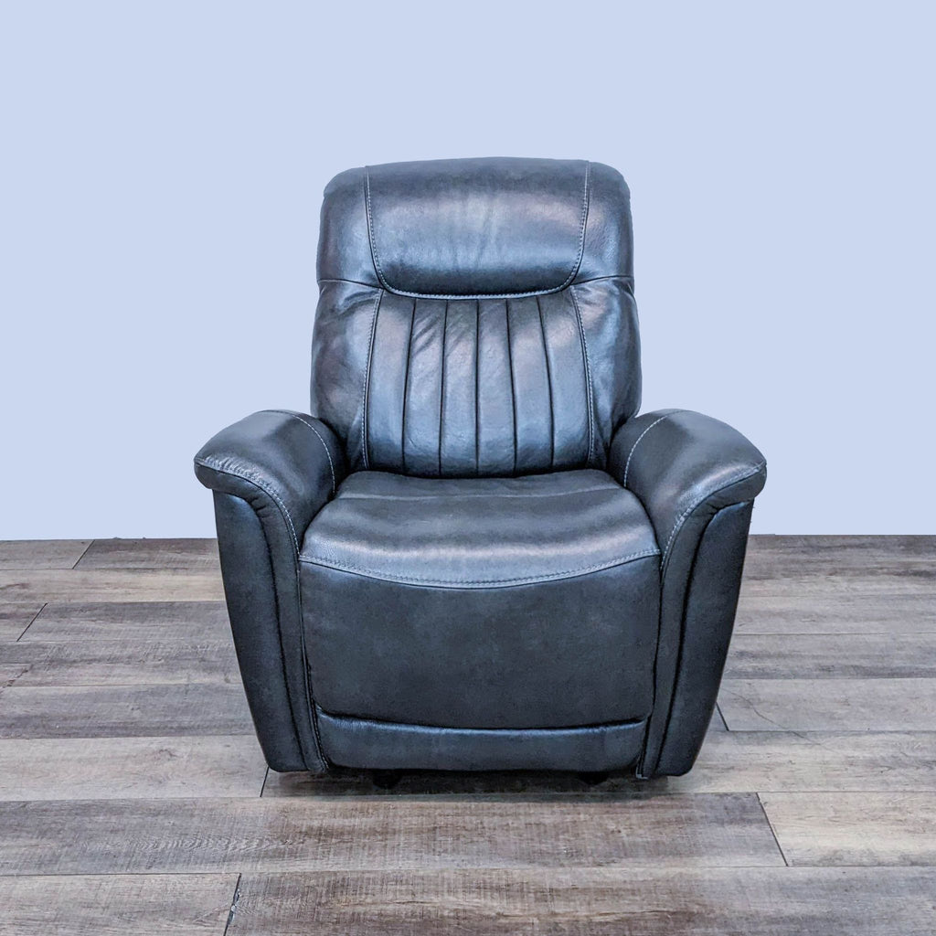 Home Meridian top grain leather power recliner with vertical back channeling and curved arms, USB port visible.