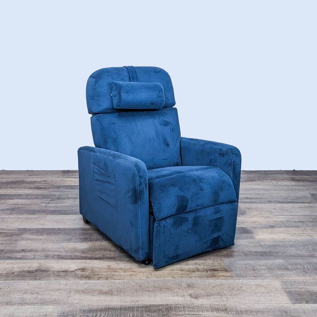 Relax The Back blue power recliner with adjustable headrest in upright position on a wooden floor.
