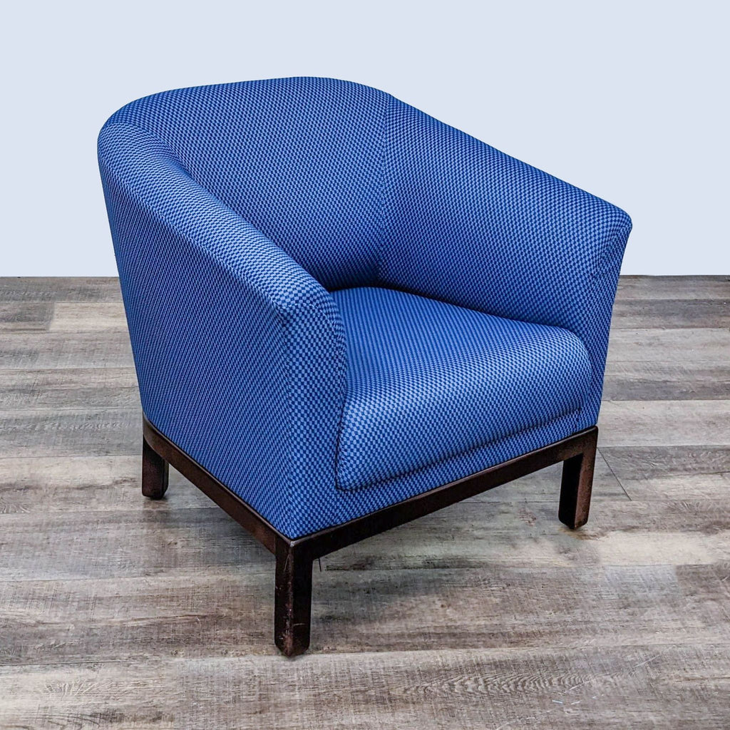 Brayton International Herron lounge chair with curved back, rolled arms, and wood feet, upholstered in blue Sweepstakes Sky fabric.