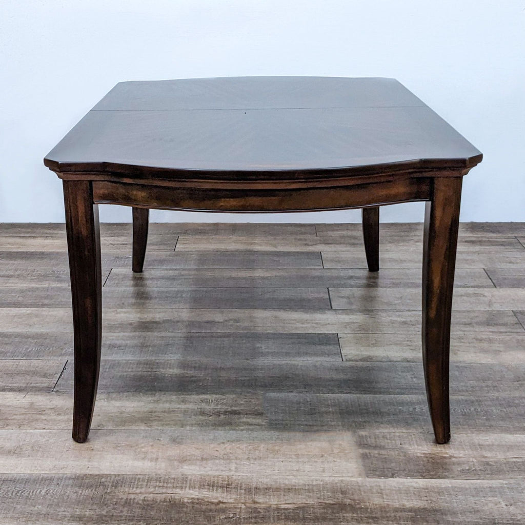 Wood veneer, expandable transitional style Reperch dining table with a close-up of the tabletop.