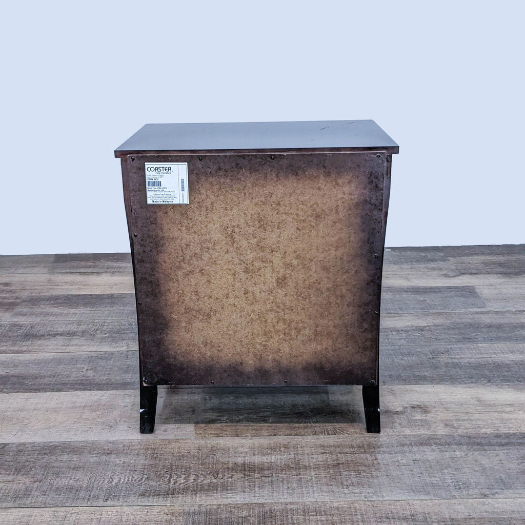 Alt text: Dark cappuccino finish hardwood Coaster Fine Furniture end table with maple veneers on a wooden floor.