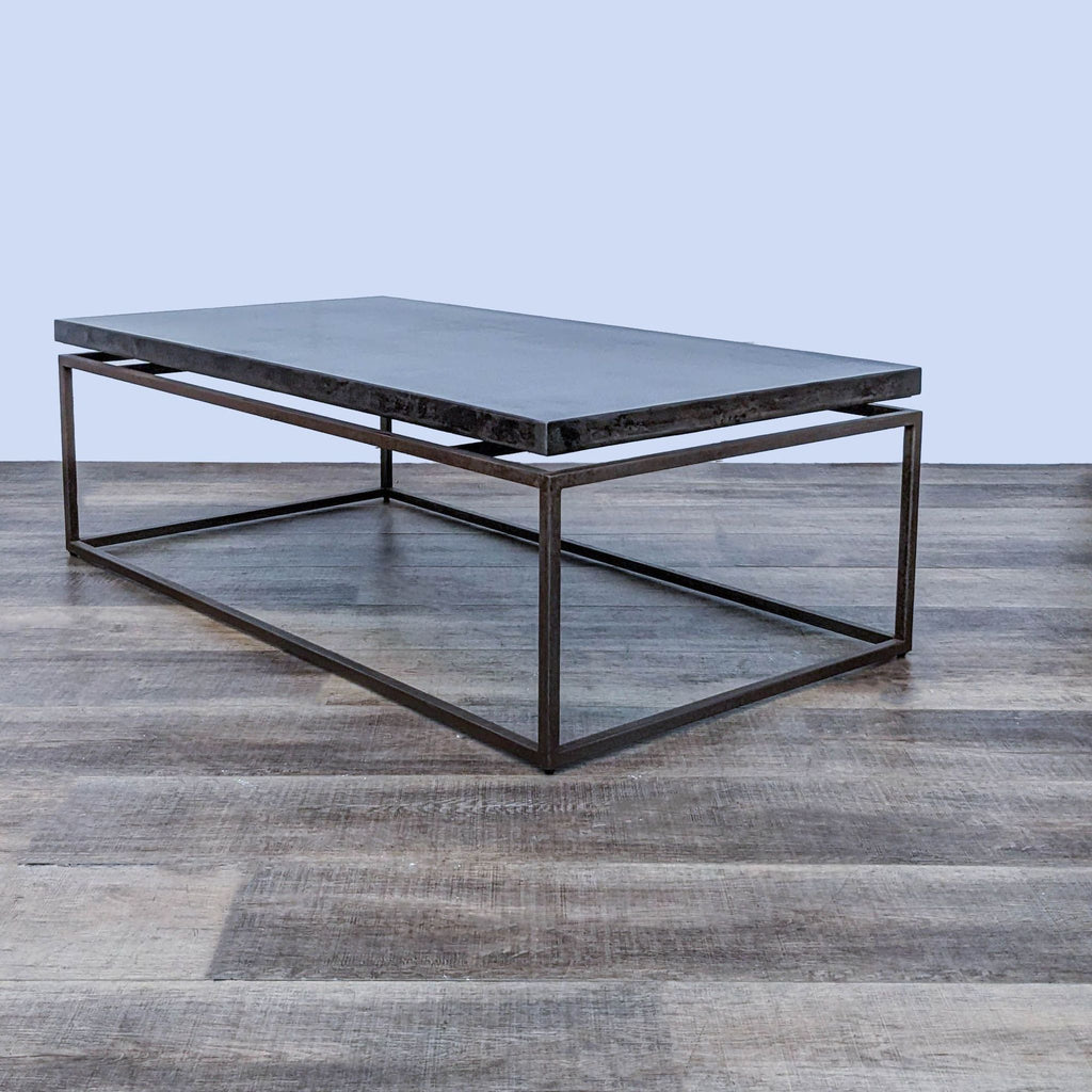 Modern Reperch coffee table featuring an all-metal suspended top design, set against a wooden flooring backdrop.