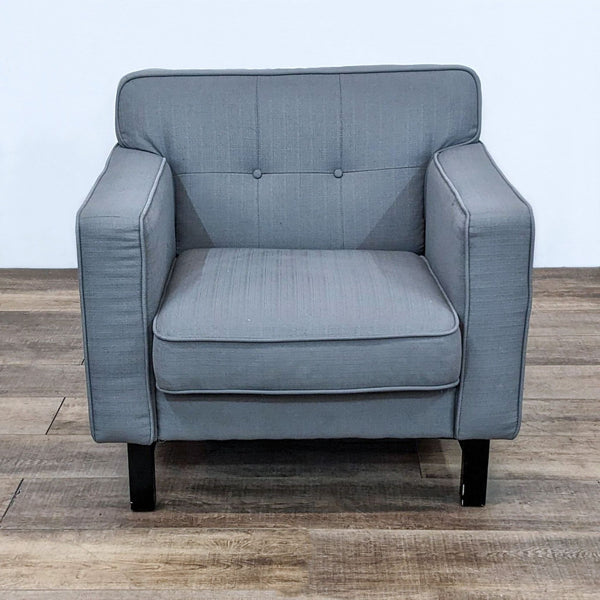 Reperch contemporary gray lounge chair with clean lines and button tufting, viewed from the front.