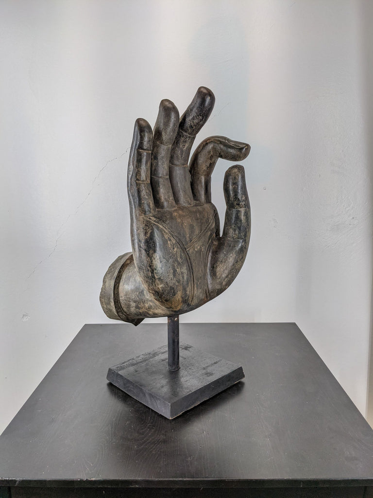 1. Vintage bronze Buddha hand sculpture in vitarka mudra, mounted on a polished granite base by Reperch.