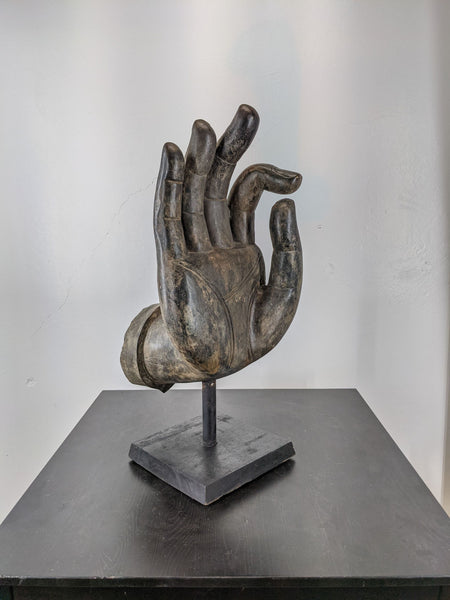 1. Vintage bronze Buddha hand sculpture in vitarka mudra, mounted on a polished granite base by Reperch.