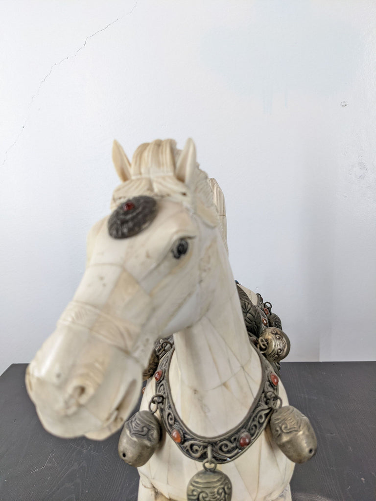2. Close-up of a Reperch Tang-style horse sculpture, bone mosaic body with intricate metal and stone-embellished saddle.  
