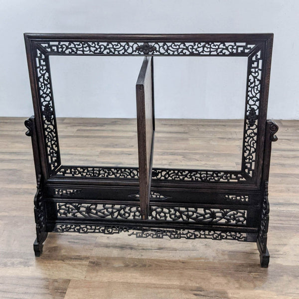 1. Ornate wooden Reperch frame with intricate carvings, shown empty and standing on a wood floor.