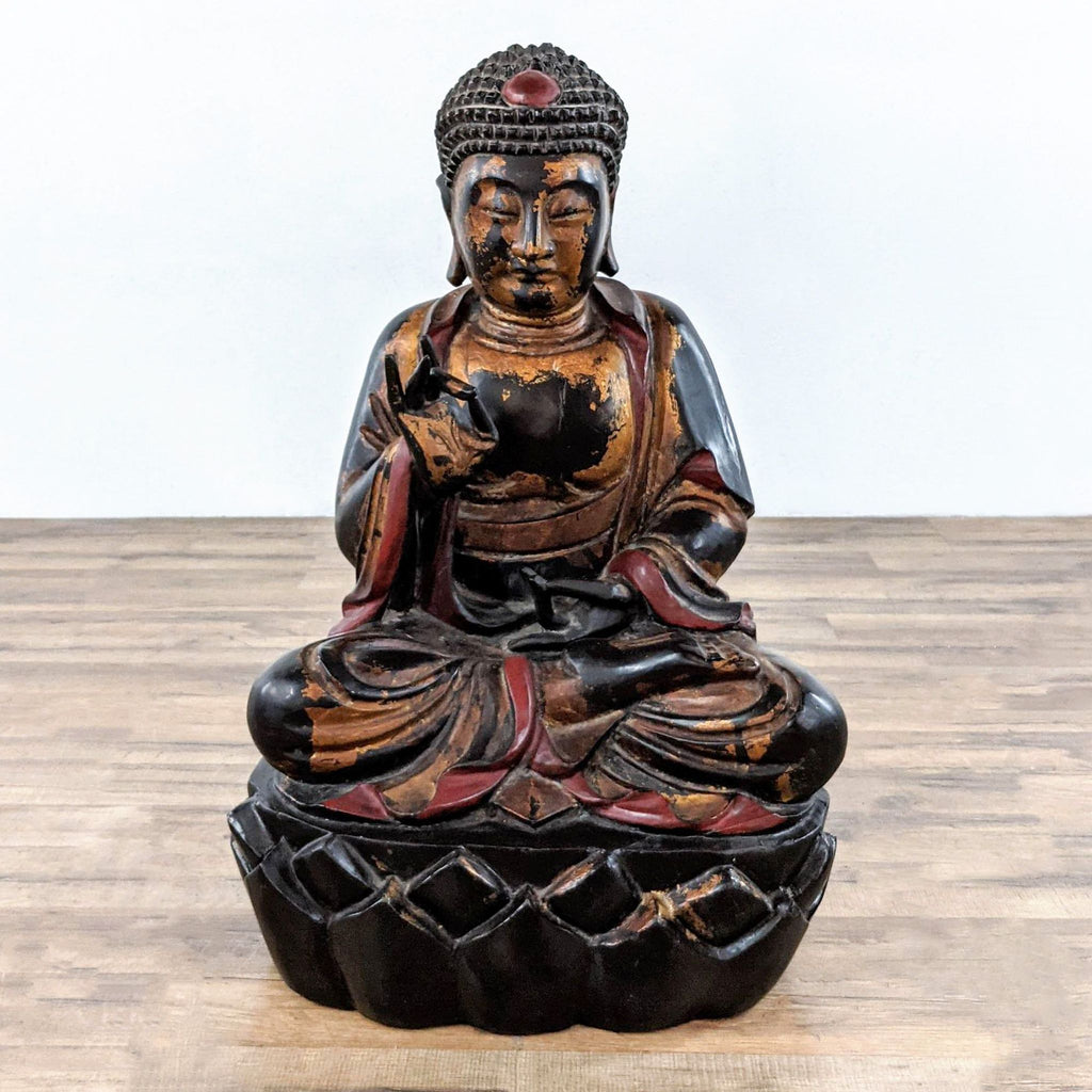 3. Full view of Reperch Buddha sculpture on lotus throne, with gilded wood and red-black robes.
