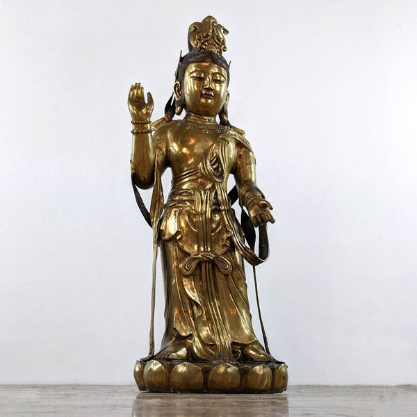 Bronze Reperch Kwan-yin Guan Yin statue, 38” tall, standing on a lotus base with raised hand gesture.