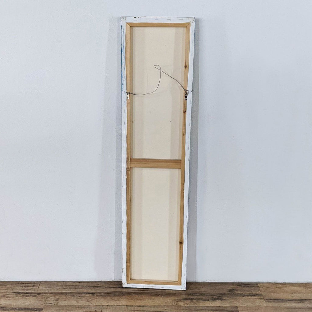 2. Back view of a tall rectangular canvas artwork from Reperch, showing wooden stretcher bars and hanging wire.