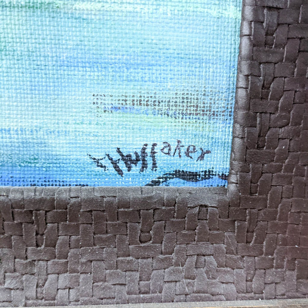 Close-up view of the artist Sandy Huffaker's signature on the painting, visible on canvas near the frame edge.