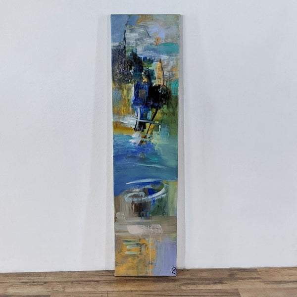 1. Abstract modern art painting on a narrow canvas, signed by artist, featuring bold blue and yellow brushstrokes.