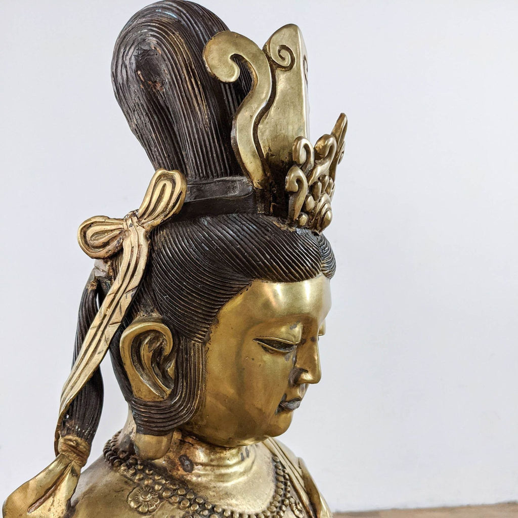 Close-up of the 38” Reperch Kwan-yin Goddess statue’s face, ornate gold crown, and detailed hair design.